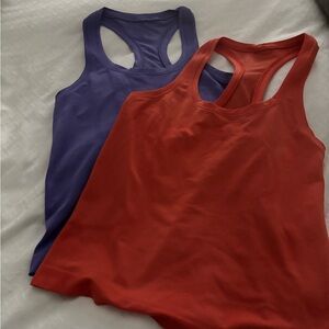 Lululemon Swifty, tank tops in Purple and Orange
Set of Two